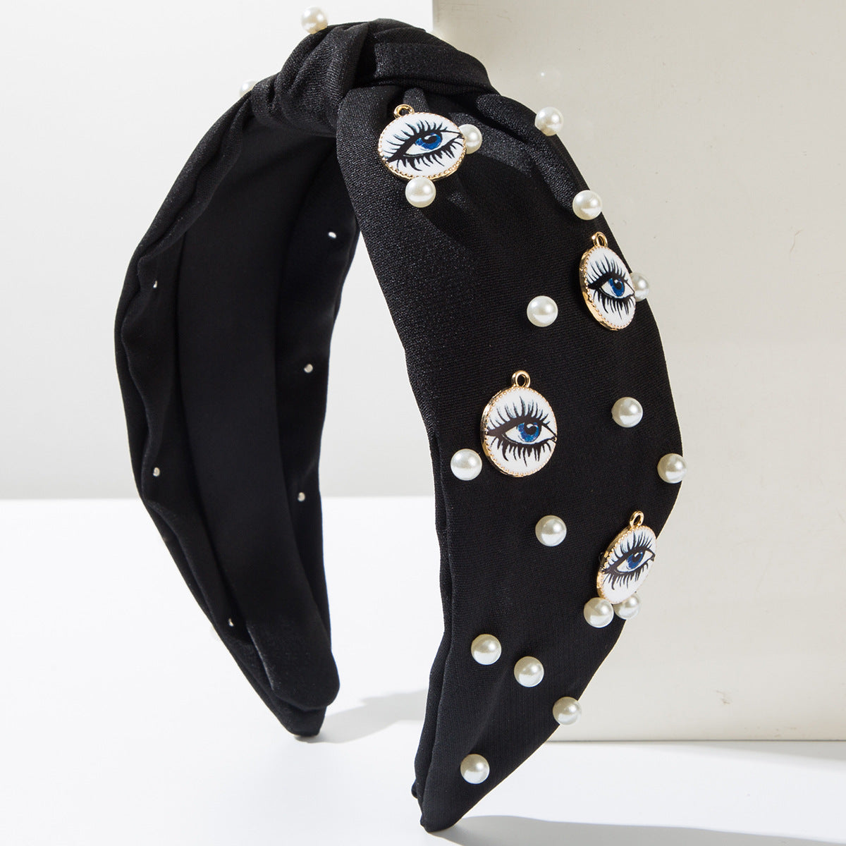 Wholesale Pearl round devil eye headband accessories